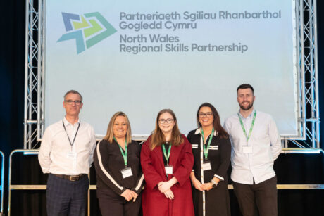 North Wales RSP Team, standing on the stage during an event.