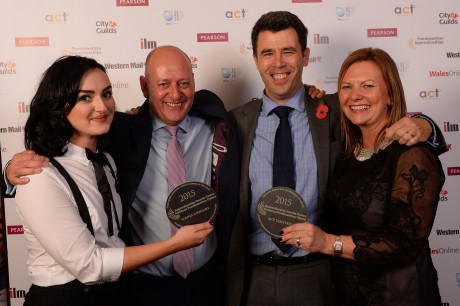 ACT Limited’s directors Andrew (second from left) and Caroline Cooksley and Louisa Gregory  (left) with Huw Morris, the Welsh Government’s director of skills, higher education and lifelong learning, who presented them with their awards.