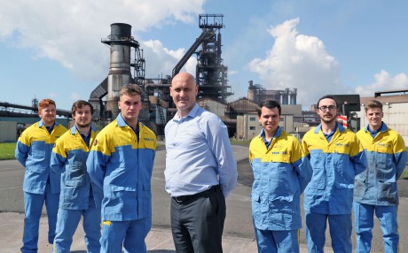 Training delivery manager Huw Mathias with apprentices at Tata Steel in Port Talbot.