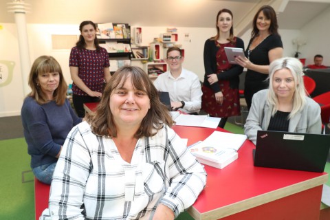 Jo Ford, ONS’s talent, inclusion and apprenticeship lead, with apprentices.