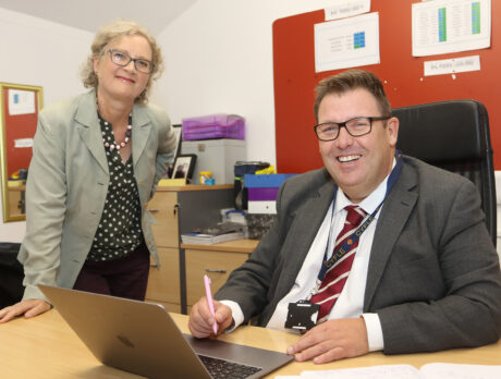 Head teacher with Assessor in the office