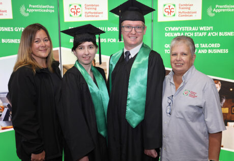 Graduates Amber Spellman and Morgan Griffiths with their training officers from Cambrian Training Company Christine Greyson and Gemma Wilkins.