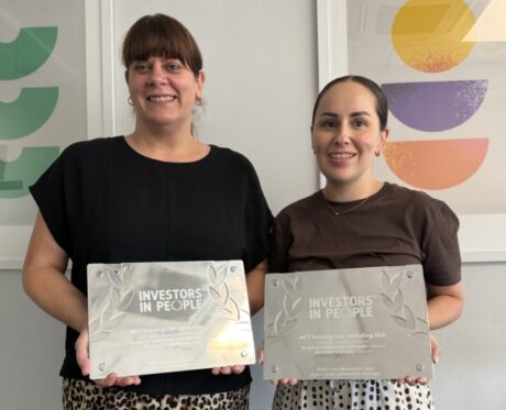 L-R: Rebecca Cooper and Beth Cooksley with the plaques.